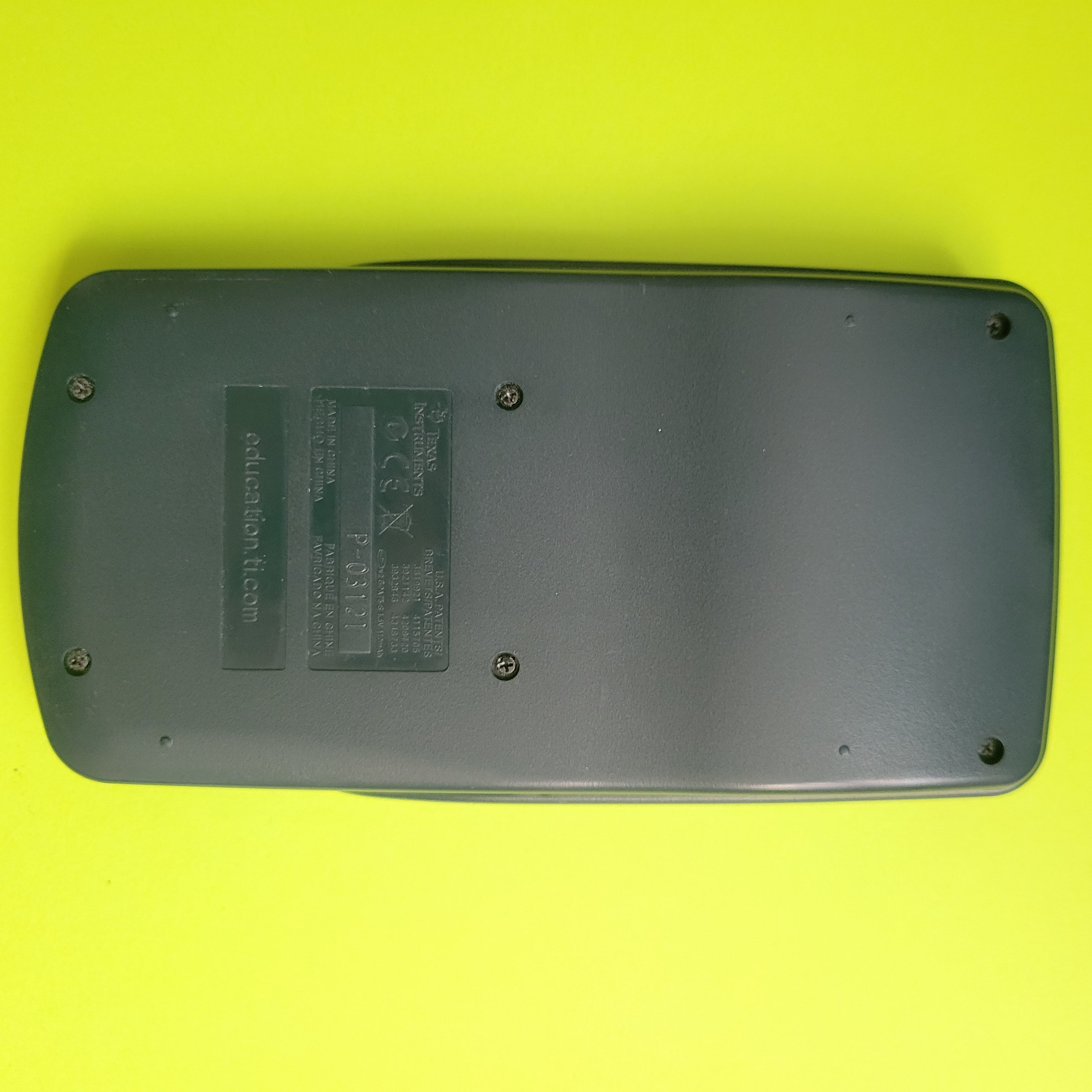 An image of the back of a texas instruments ti-30xa scientific/engineering calculator